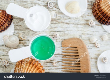 stock-photo-two-small-scoops-with-hair-mask-conditioner-and-green-gel-with-spirulina-and-marine-collagen-1116128741